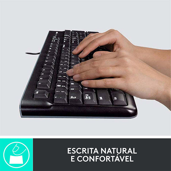 Black Logitech keyboard with hands typing, mouse not shown.