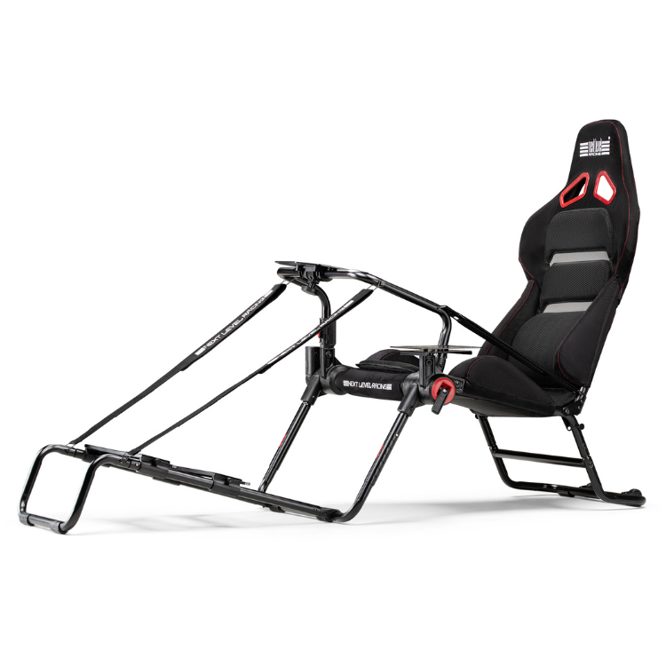 Next Level Racing GT Lite Pro foldable cockpit, black with red accents.