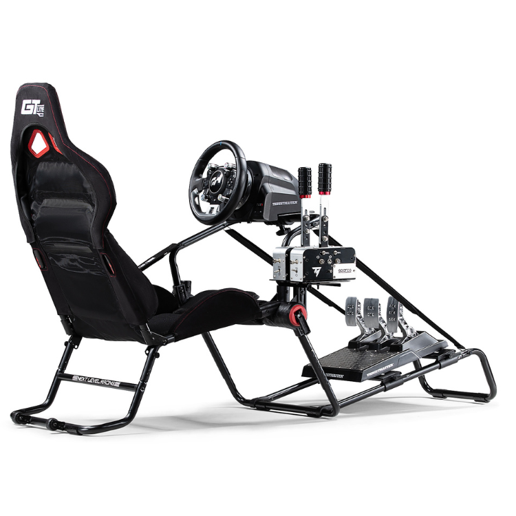 Next Level Racing GT Lite Pro Foldable Cockpit, black gaming chair with red accents, steering wheel, and pedals.
