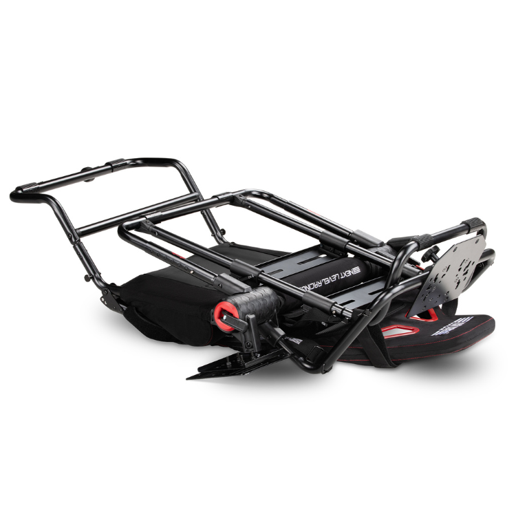 Next Level Racing GT Lite Pro Foldable Cockpit, black with red accents, metal frame, folded position.