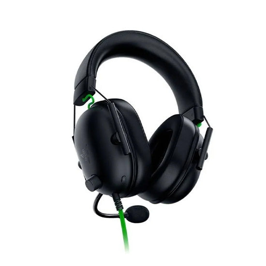 Black Razer Blackshark V2 X 7.1 gaming headset with green accents and microphone.