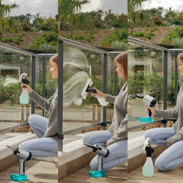 Aspirador de janelas Cecotec Conga Rockstar 3700 Glass, mulher a limpar vidros com pulverização, limpeza e aspiração.