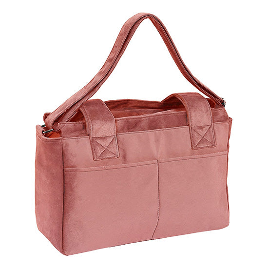 Bolsa adaptável ao carrinho de bebé Safta Marsala, cor rosa, com alça e vários bolsos.