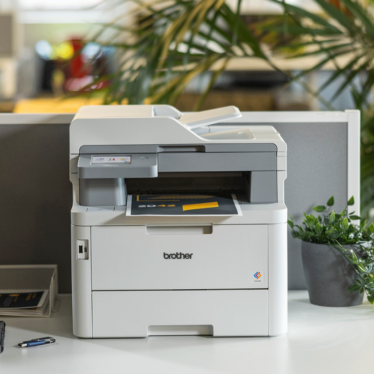 Brother MFC-L8390CDW color laser multifunction printer on office desk.