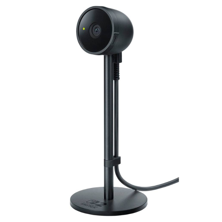 Black Nintendo Switch camera on stand with cord, green indicator light.
