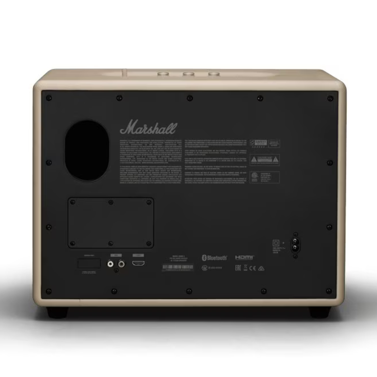 Marshall Woburn III Bluetooth speaker, cream-colored, rear view showing ports and controls.