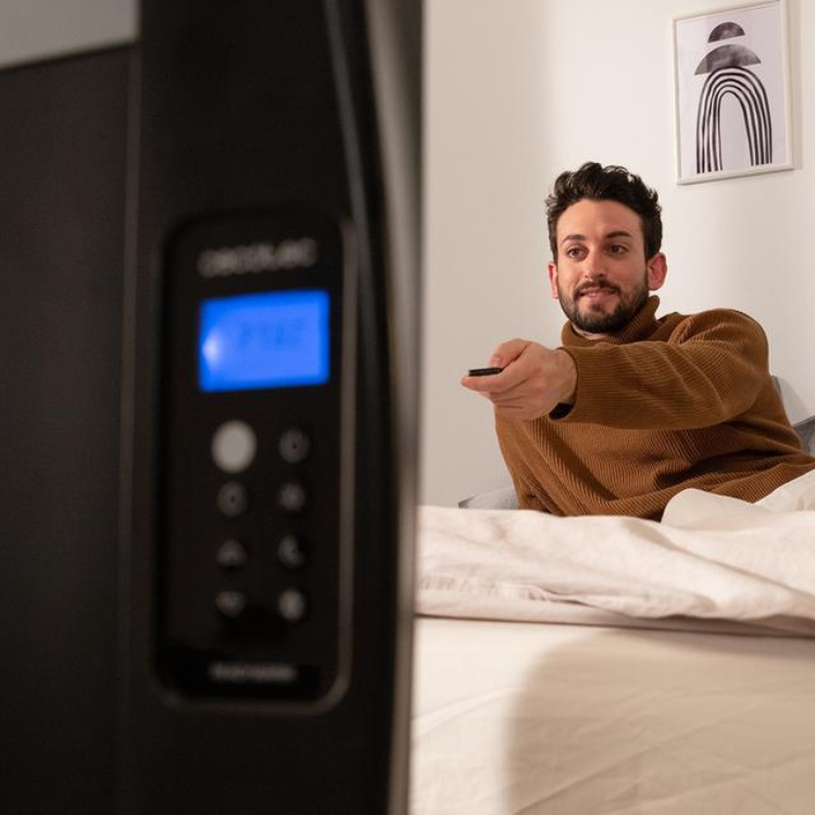 Black Cecotec Ready Warm 2500 Thermal heater with digital display and remote control.