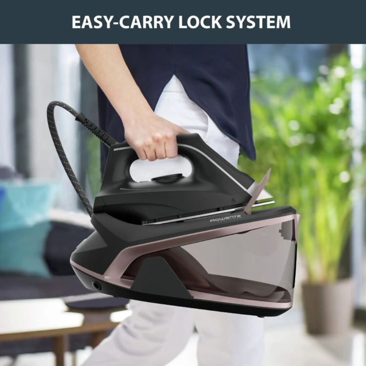 Rowenta VR7141F0 Easy Steam iron with caldiera, black and rose gold, 2400W, held by a person.