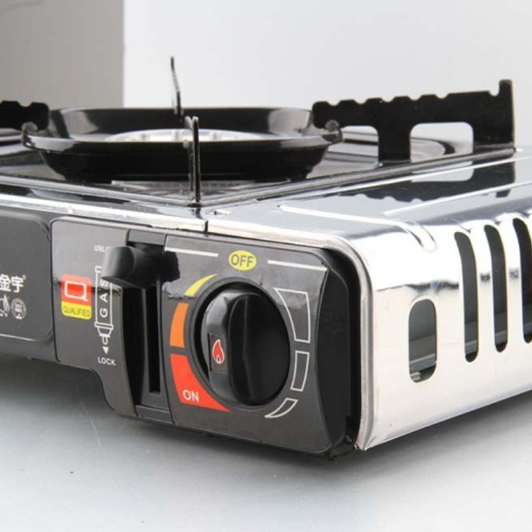 Portable gas stove, silver and black, one burner, control knob with on/off.