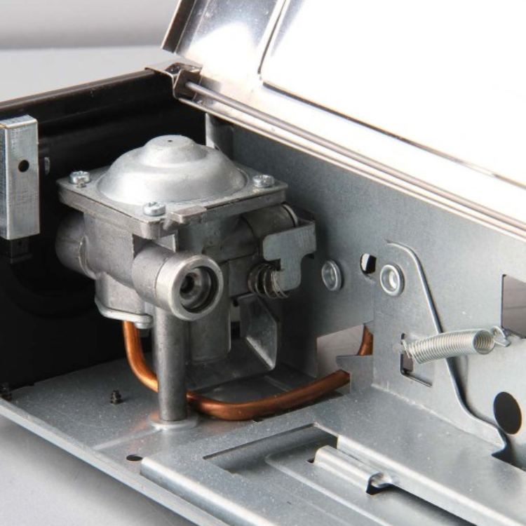 Portable gas stove internal mechanism, silver metal, copper wires, 1 burner, no brand visible.