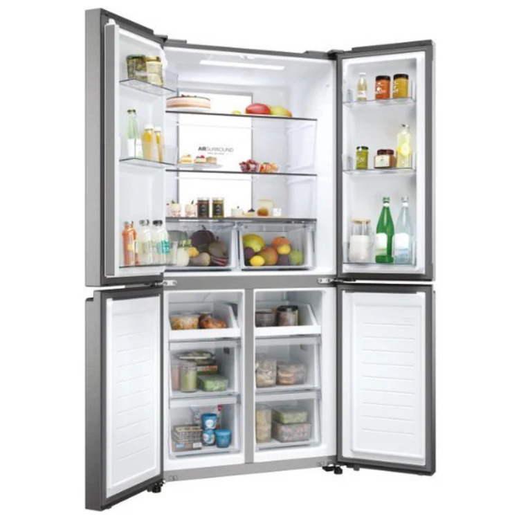 Haier HCR7818DNMM American fridge, stainless steel, 467L, open doors showing organized interior with food and drinks.