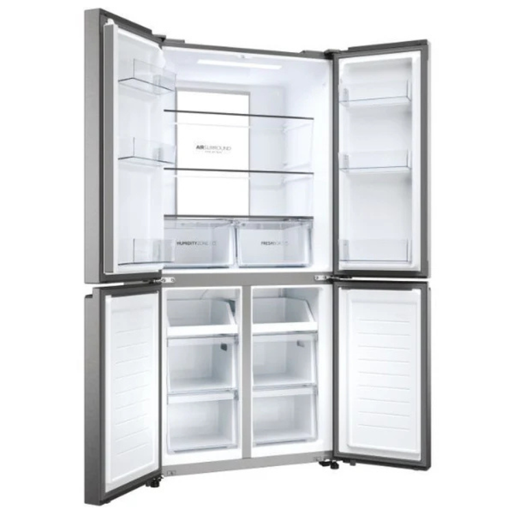 Haier HCR7818DNMM American fridge, stainless steel, 467L, open doors showing empty interior.