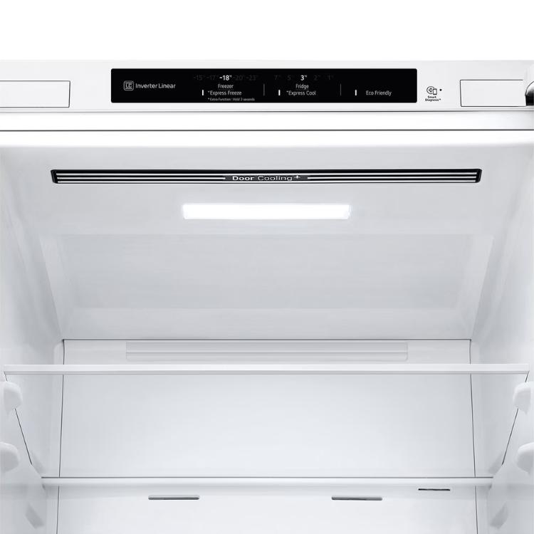 LG white fridge freezer interior with shelves and control panel.