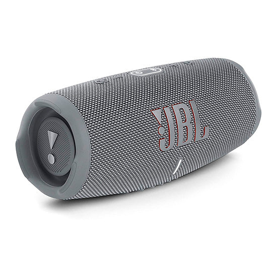 JBL Charge 5 Bluetooth speaker, gray, cylindrical, with buttons and logo visible.
