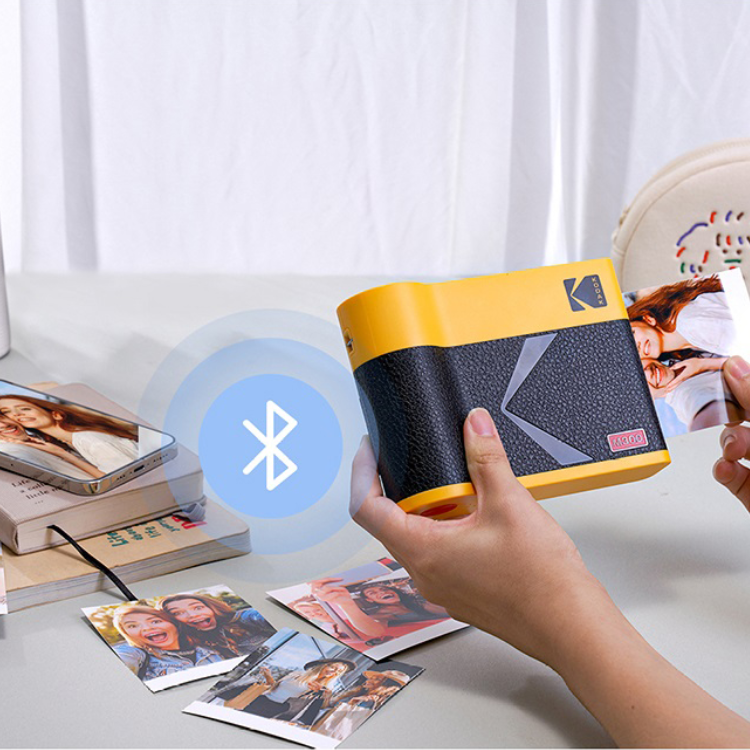 Kodak Mini 3 Era yellow portable photo printer, black and yellow body.