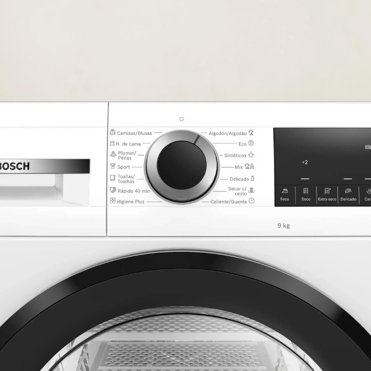 Bosch WQG245D0ES 9Kg white dryer control panel with black buttons and dial.