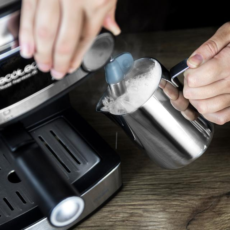 Cecotec Power Espresso 20 Professionale machine with frothing milk.