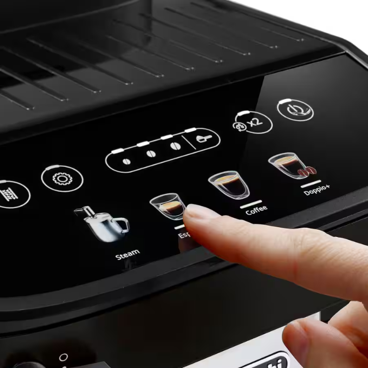 Black Delonghi Magnifica Evo coffee machine control panel with finger selecting coffee option.