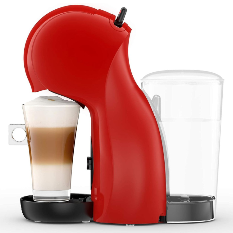 Red Delonghi Dolce Gusto Piccolo XS coffee machine with glass of layered coffee drink and empty water tank.