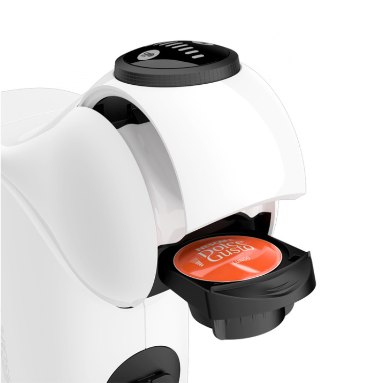 Krups Dolce Gusto Genio S white coffee machine with open capsule container.