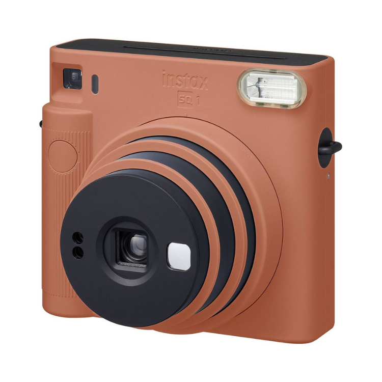 Fujifilm Instax SQ1 instant camera, orange color, black lens and accents.