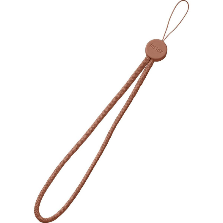Brown Instax wrist strap with logo.