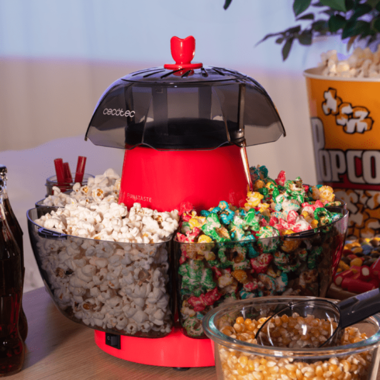 Red Cecotec Fun&Taste P'Corn Lotus popcorn maker with clear dome and bowl of popcorn.