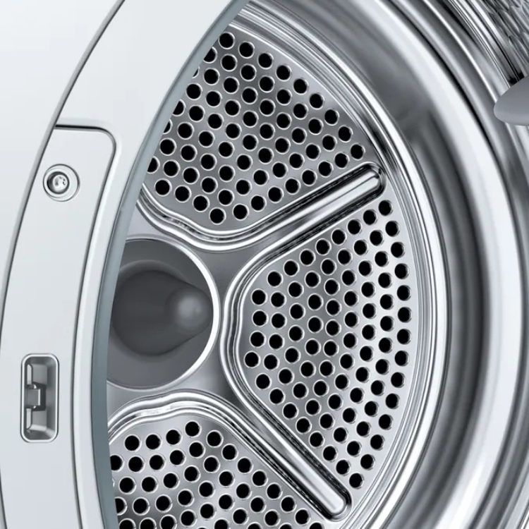 Bosch Serie 4 heat pump dryer drum with silver finish and ventilation holes.