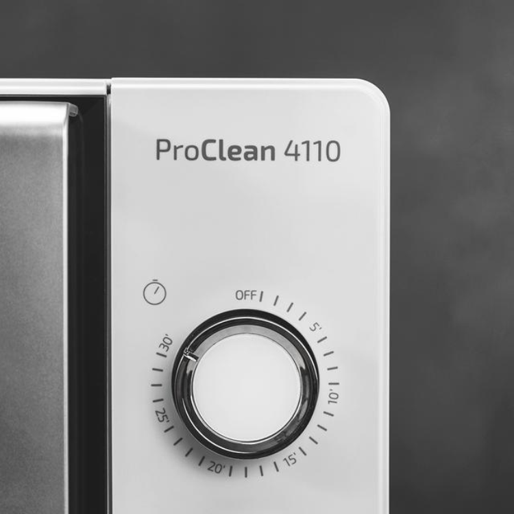 White microwave control panel, ProClean 4110, with timer dial.
