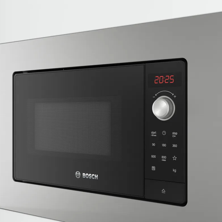 Bosch Serie 2 BEL623MS3 stainless steel microwave with black door and control panel, digital display showing 20:25.