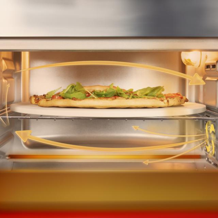 Cecotec Mini Forno Bake&Toast 2600, pizza on turntable inside.