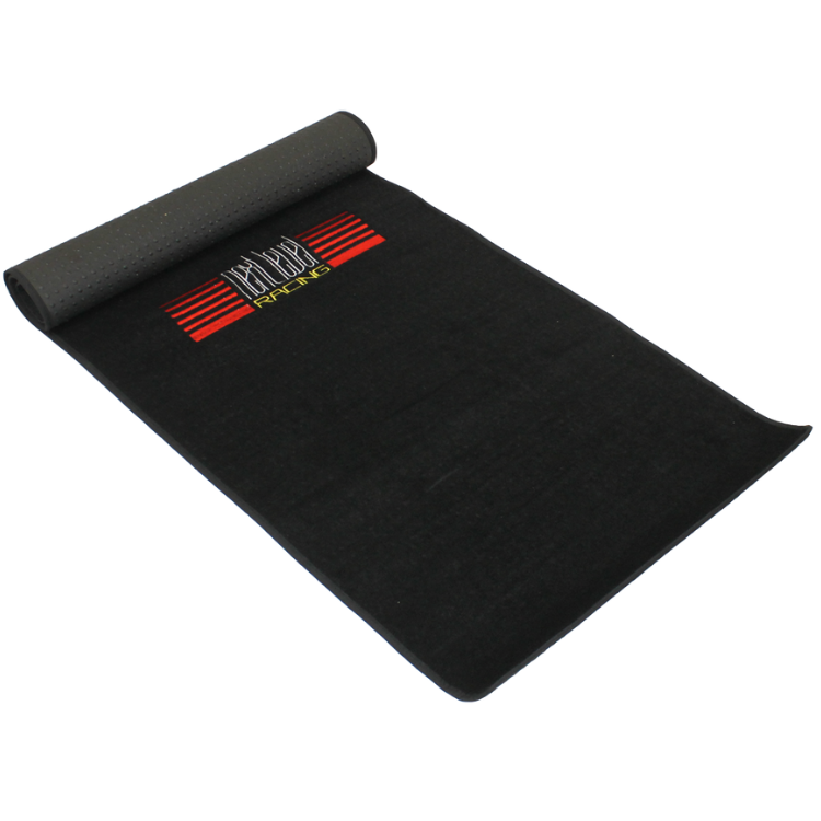 Black Next Level Racing floor mat, rolled up at one end, with red and white logo.