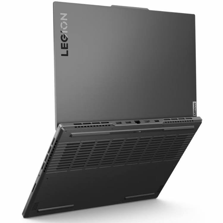 Lenovo Legion laptop, dark grey and black, open at an angle, showing vents and ports.