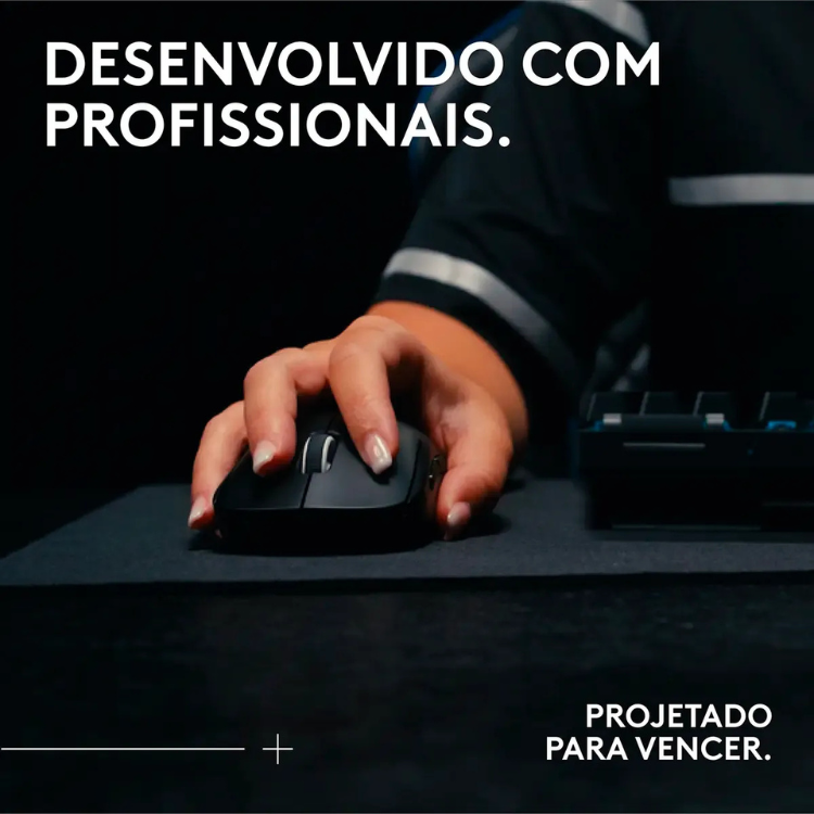 Black wireless gaming mouse, Logitech G Superlight 2 SE, 44000 DPI, in a person's hand.