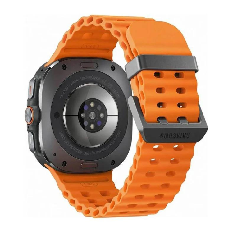 Smartwatch Samsung com pulseira laranja e corpo preto, virado para trás, mostrando a parte de trás do ecrã.