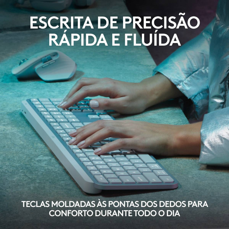 Logitech MX Keys S keyboard, white, wireless, with hands typing on it.