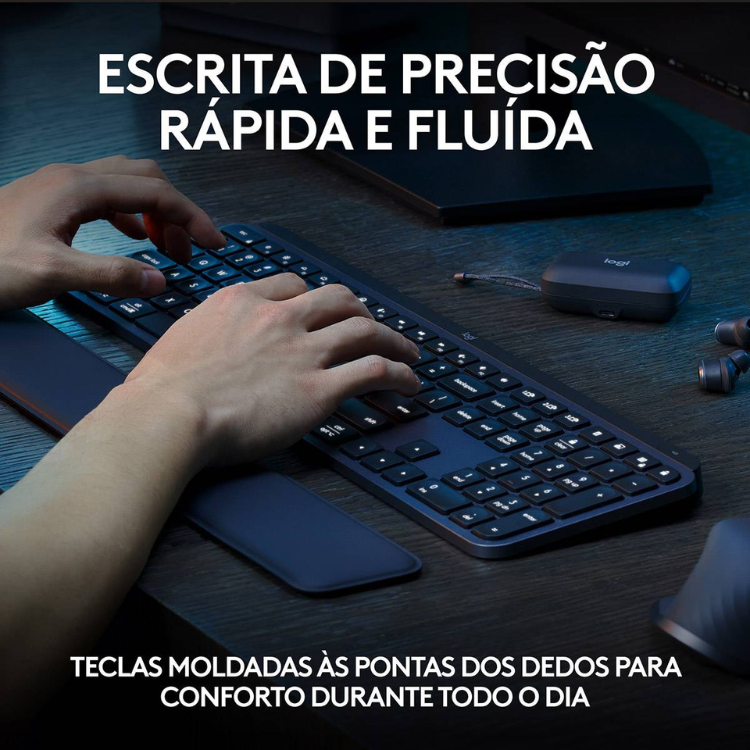 Logitech MX Keys S Bluetooth keyboard, gray, with person's hands typing.