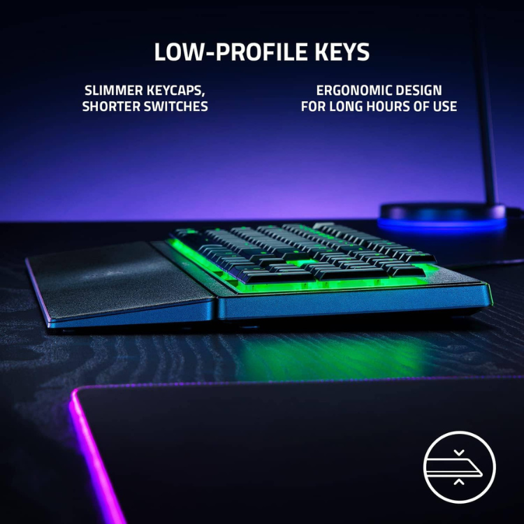 Black Razer gaming keyboard with green and blue RGB lighting, low-profile keys.
