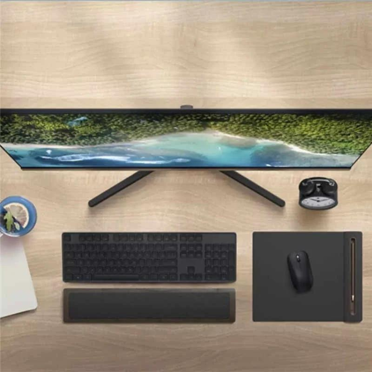 Monitor Xiaomi Mi 1C IPS FHD 23.8" preto com imagem de praia na tela.