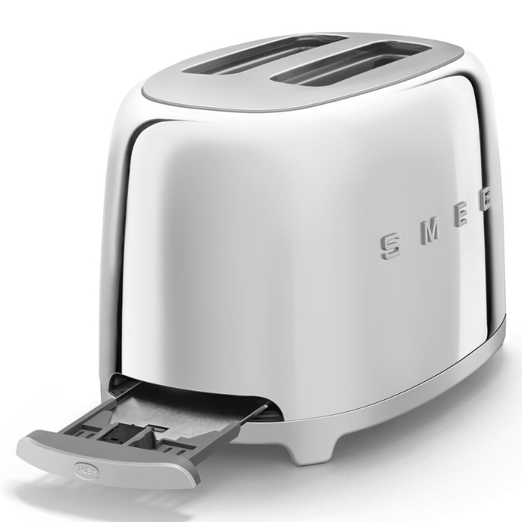 Smeg chrome toaster with 2 slots and crumb tray extended.