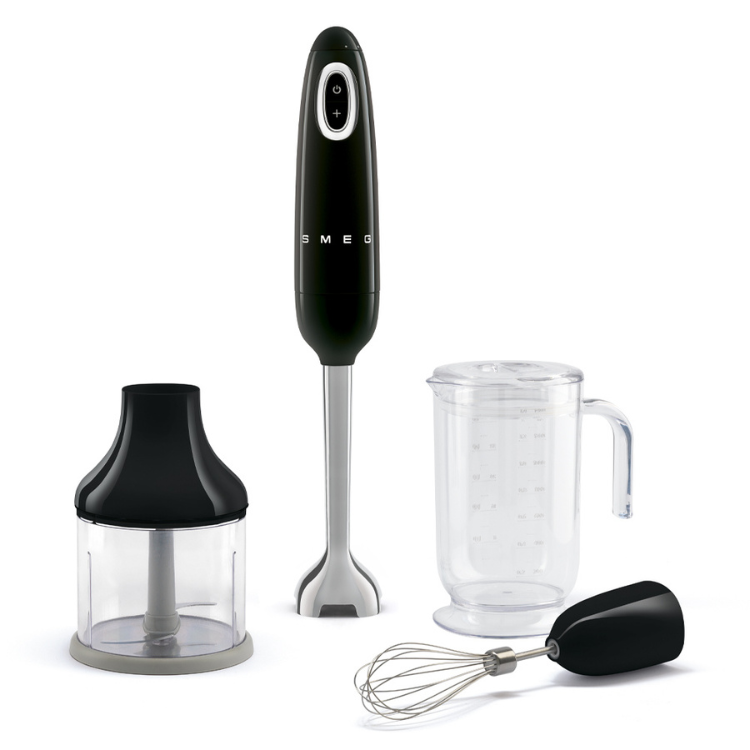 Black Smeg handheld blender with accessories, including measuring cup, whisk, and chopper.