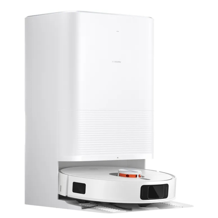 White Xiaomi X20 Pro robot vacuum docked in charging station.
